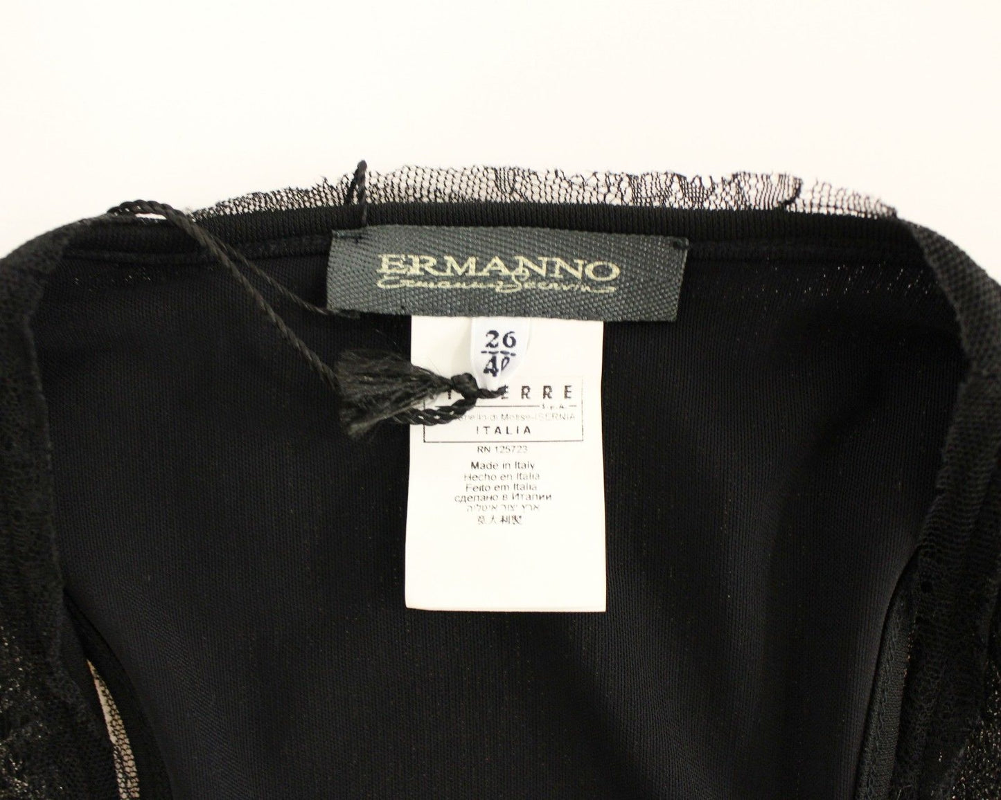 Schwarzes mit Spitze gefüttertes Stretch-Minikleid