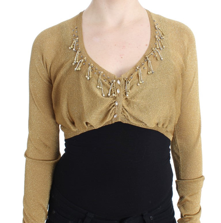 Goldfarbener Shrug mit Verzierungen