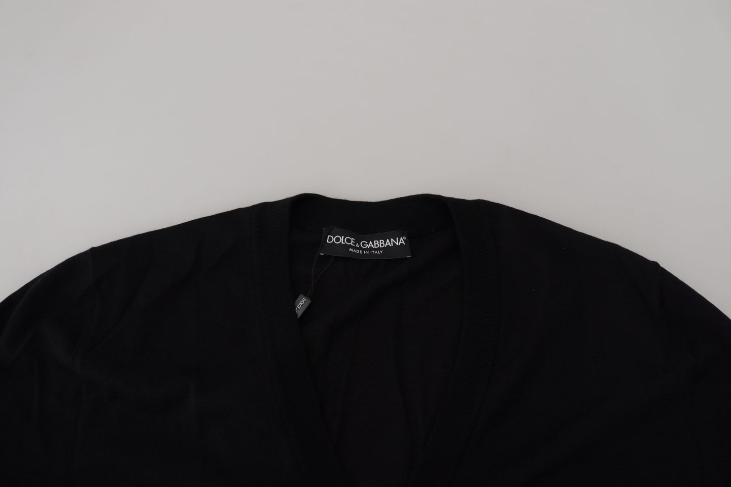 Schwarze Strickjacke aus Wolle mit Knopfleiste
