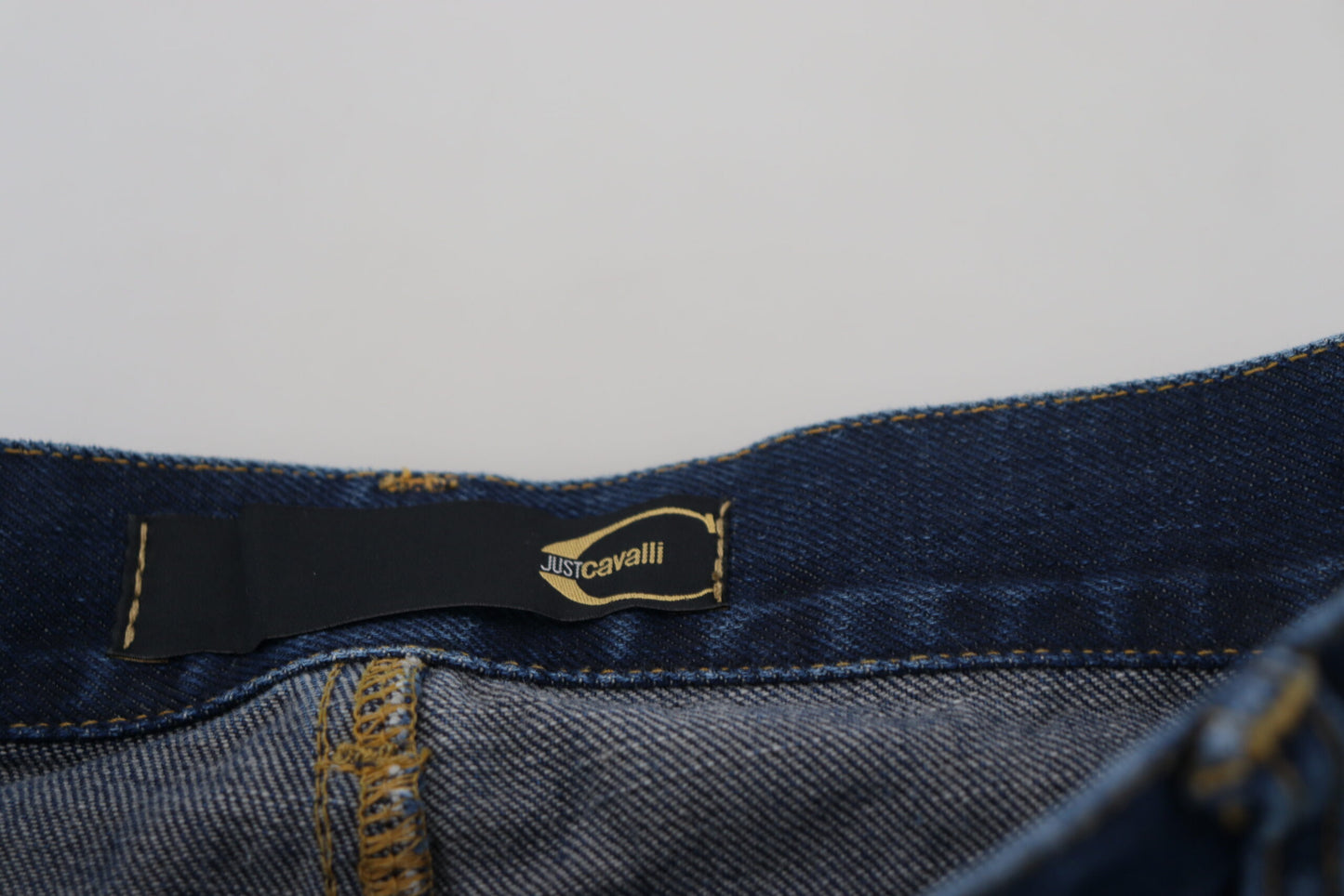 Blaue Baumwoll-Denim-Jeans mit ausgestelltem Bein und niedriger Taille