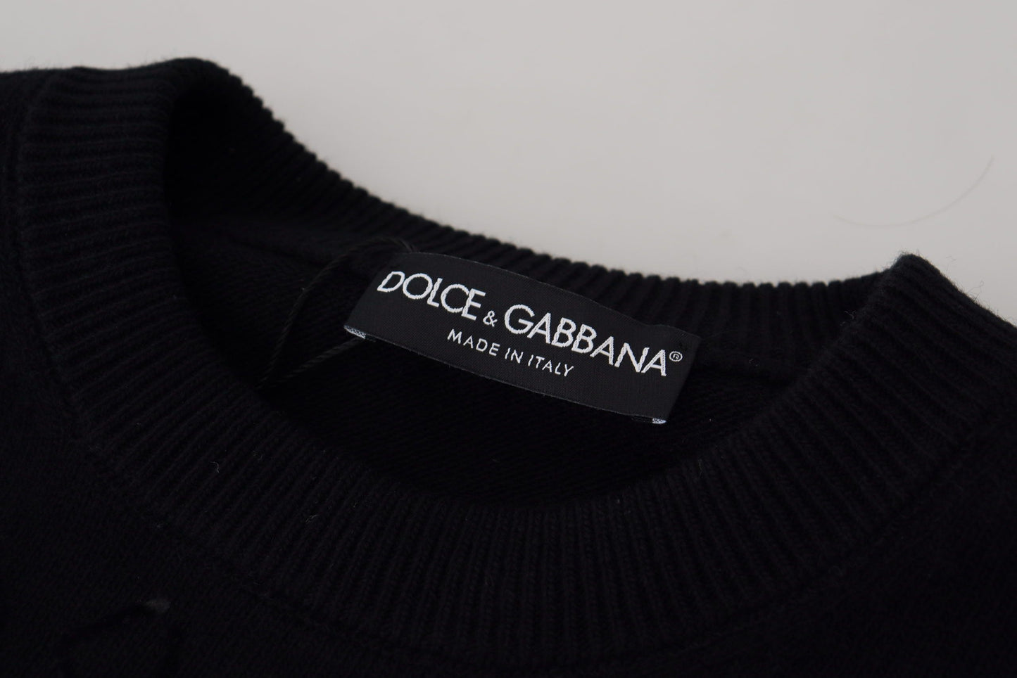 Schwarzer Wollpullover mit Logo-Muster und Rundhalsausschnitt