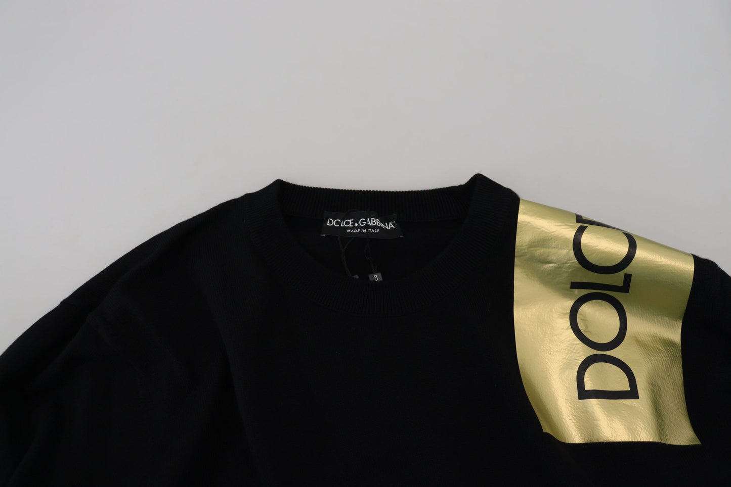 Pullover mit Rundhalsausschnitt aus schwarzer Wolle und goldenem Logo
