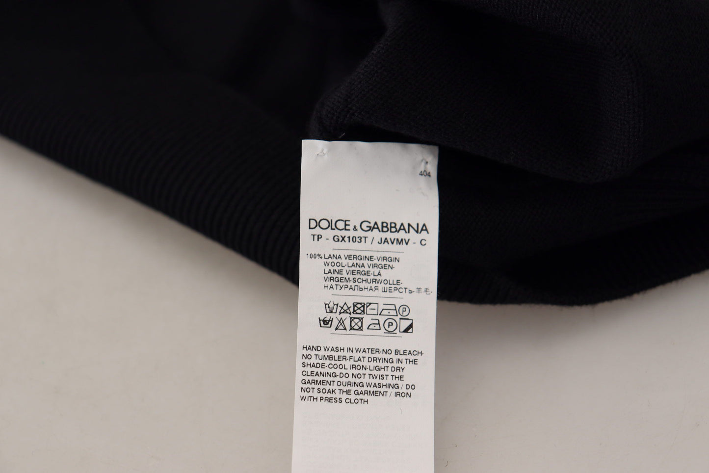 Pullover mit Rundhalsausschnitt aus schwarzer Wolle und goldenem Logo