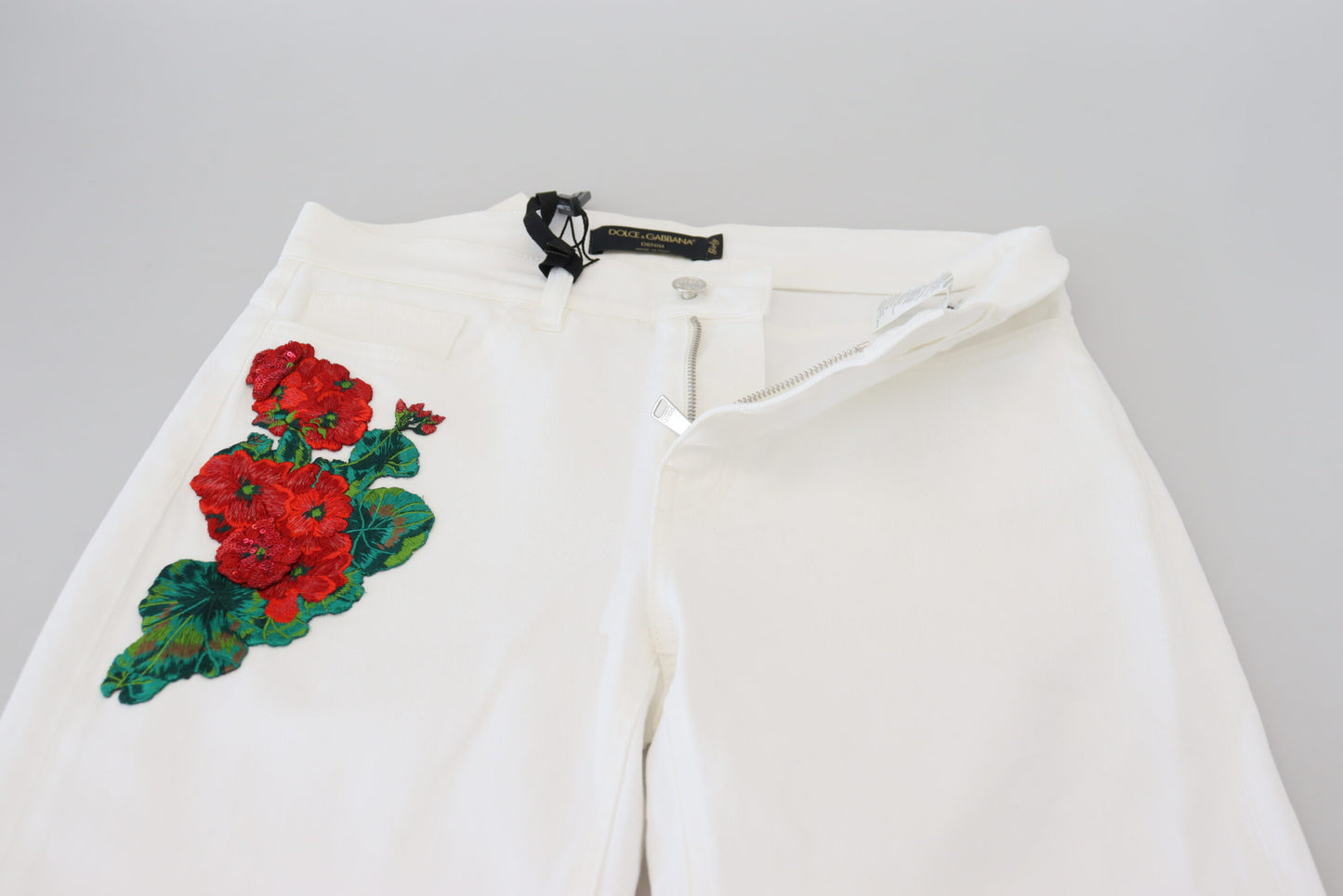 Weiße Skinny Denim-Jeans mit Blumenstickerei