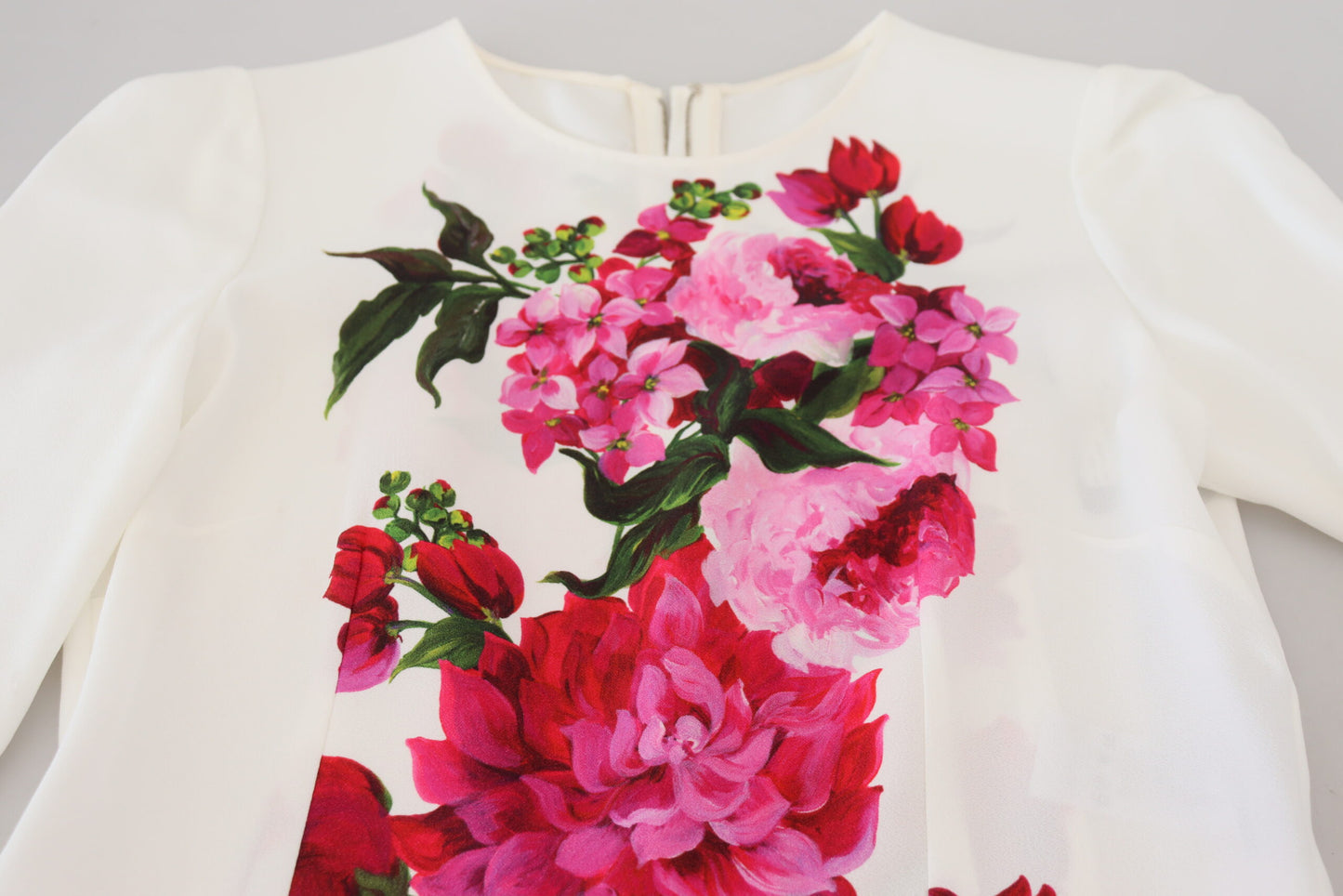 Weißes Blusentop mit Blumenmuster und Rundhalsausschnitt