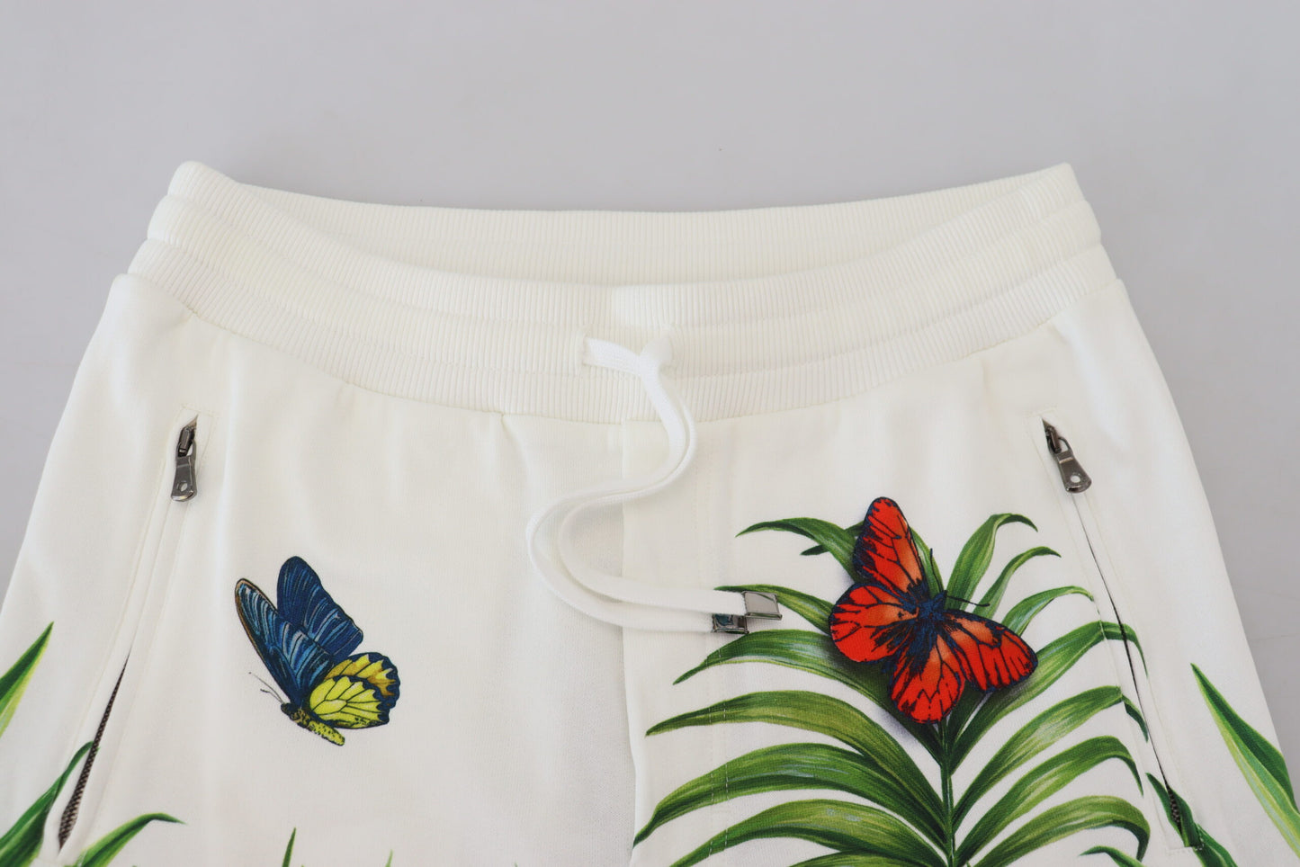 Weiße Jogginghose mit botanischem Print