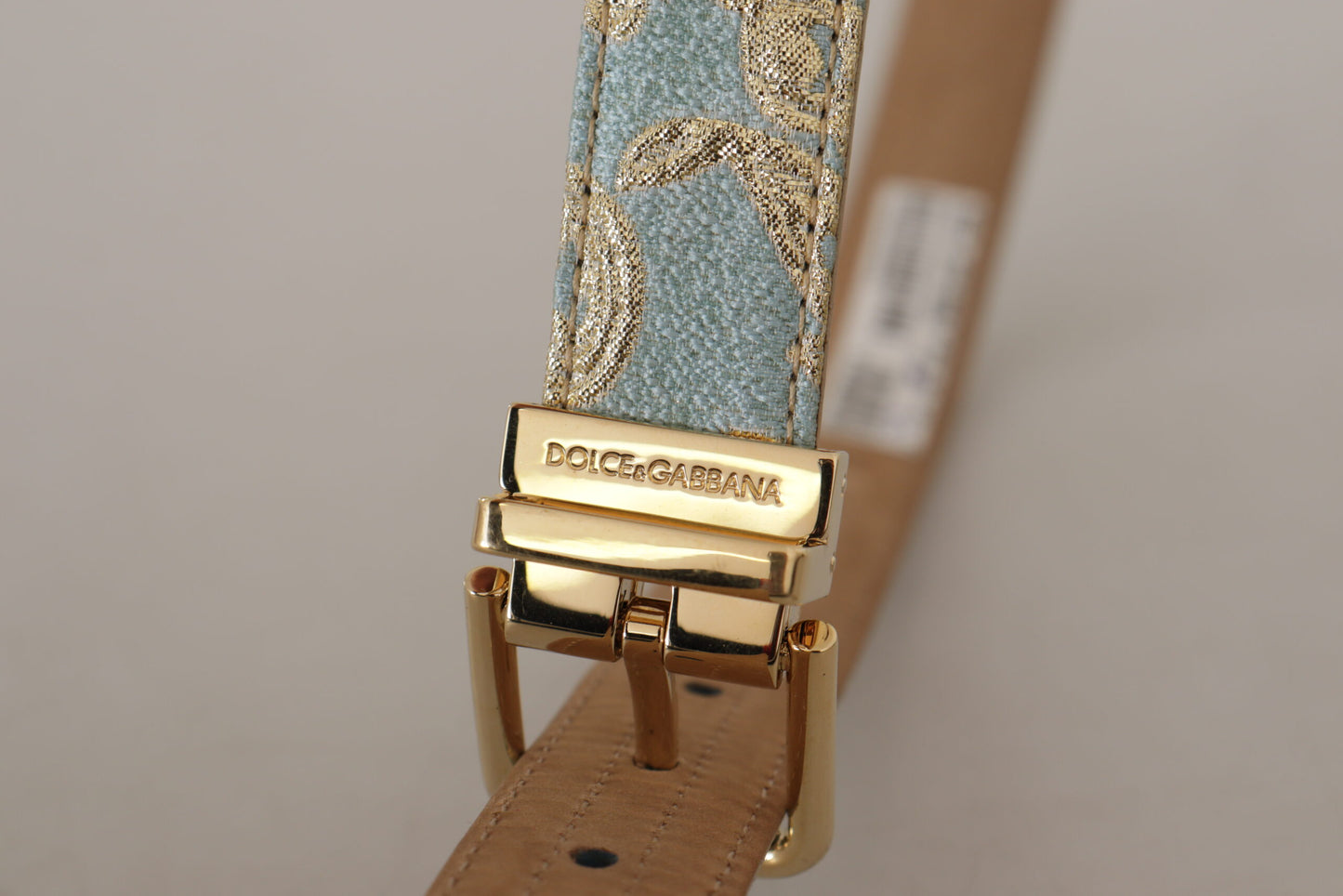 Blauer Leder-Jacquardgürtel mit geprägter goldener Metallschnalle