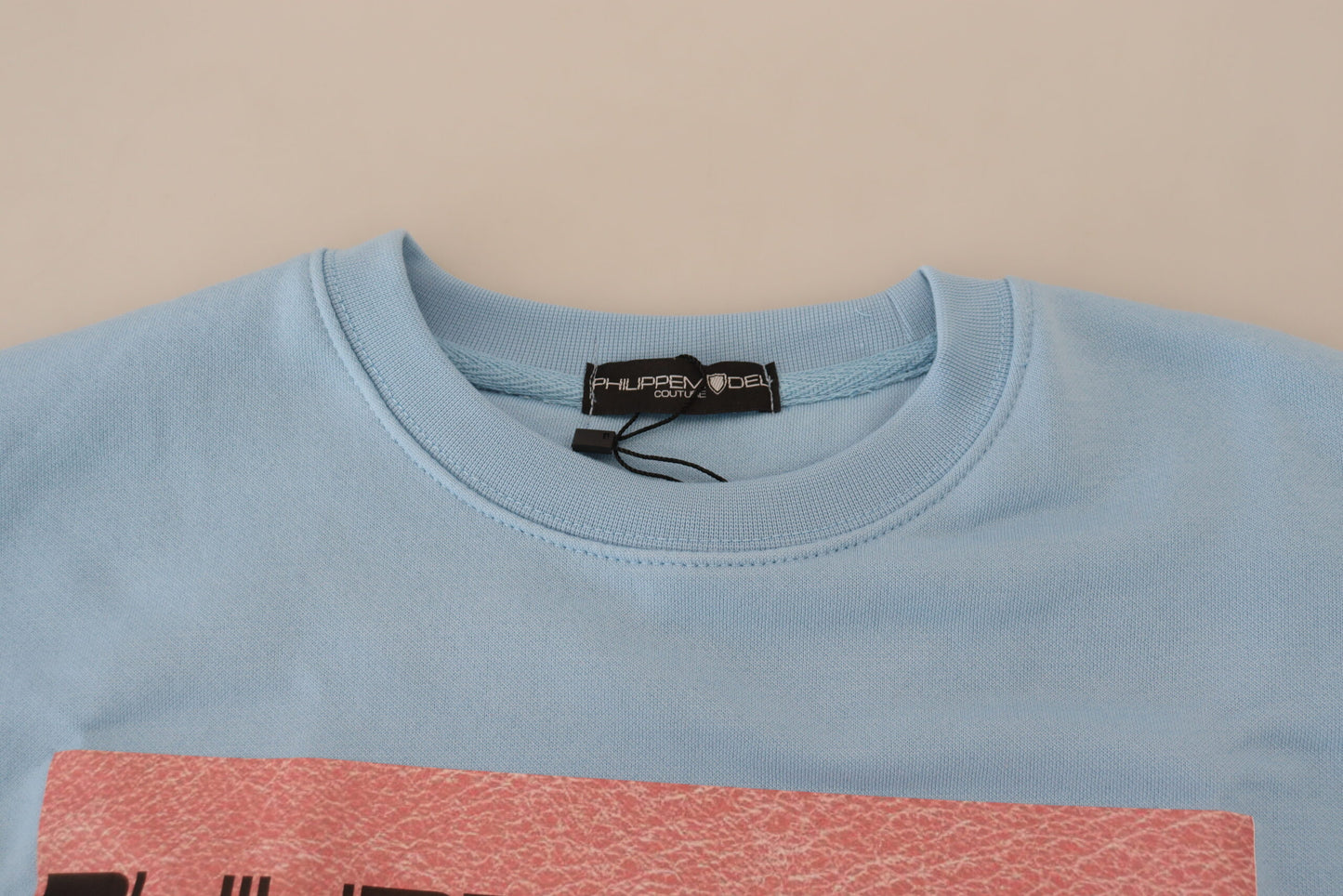 Hellblauer Pullover mit Logodruck und langen Ärmeln
