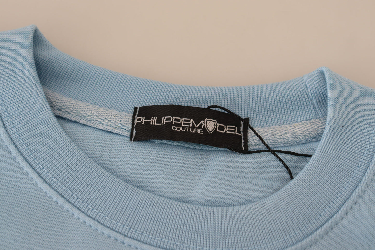Hellblauer Pullover mit Logodruck und langen Ärmeln