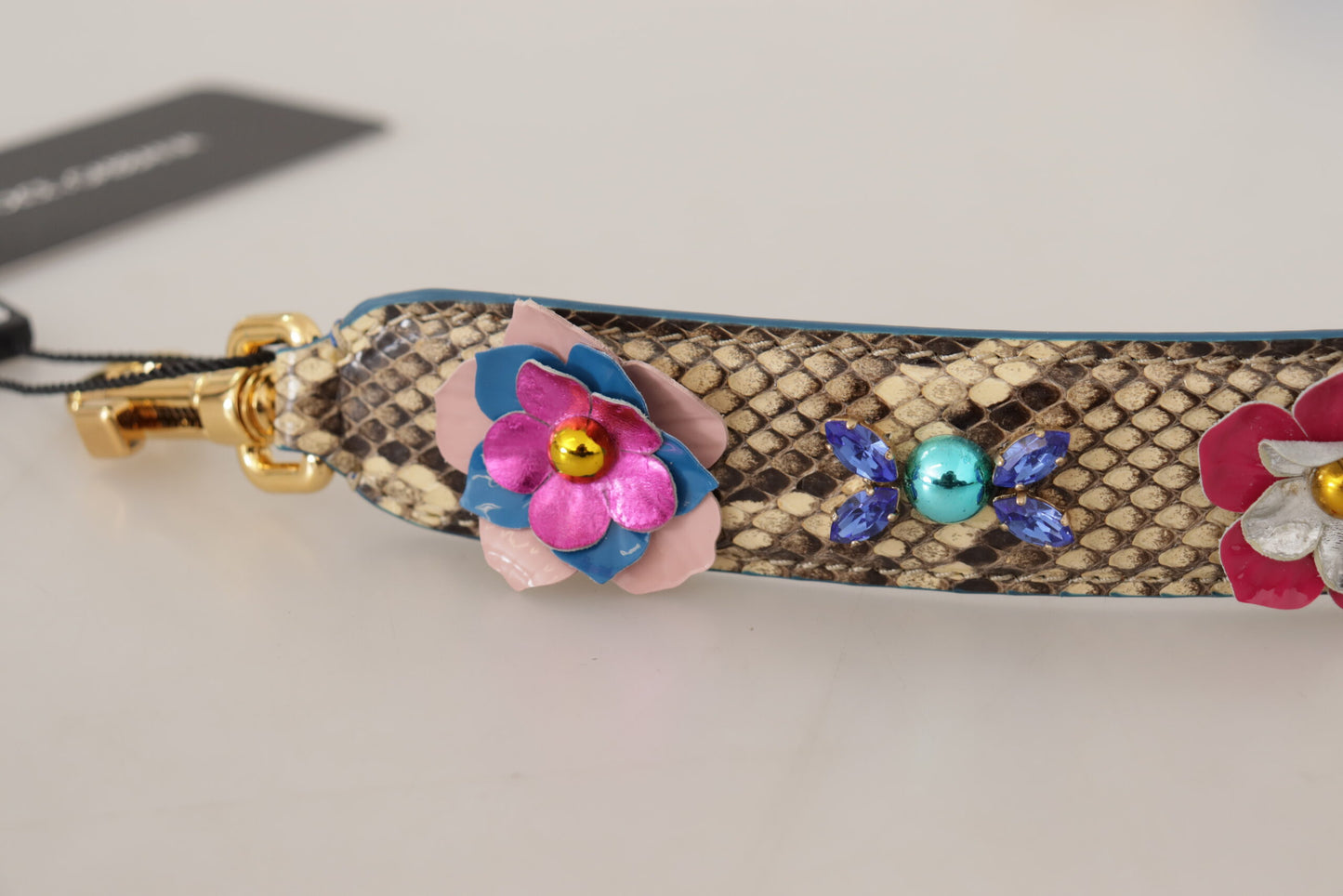 Beigefarbener Pythonleder-Schulterriemen mit floralen Nieten