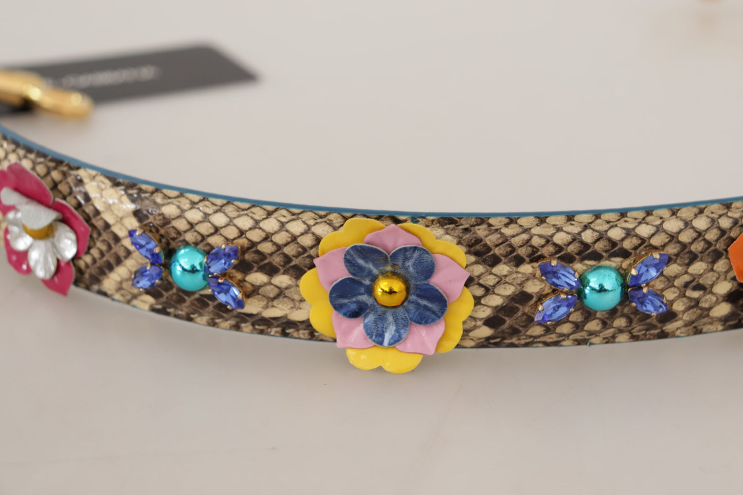 Beigefarbener Pythonleder-Schulterriemen mit floralen Nieten