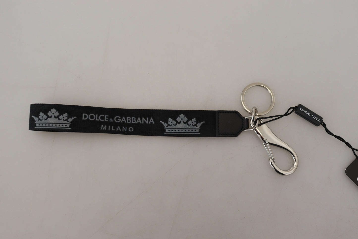 Schwarzer Polyester Logo Silberton Messing Schlüsselanhänger