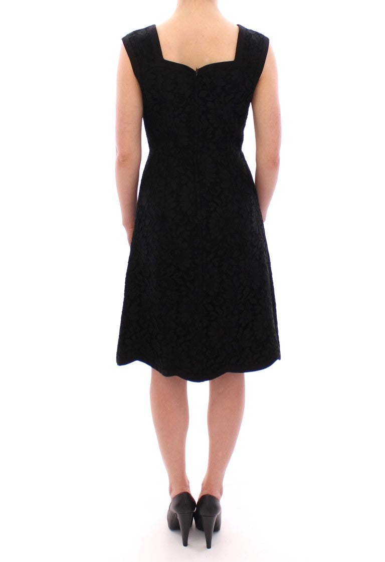 Schwarzes Laufstegkleid aus geblümter Spitze von Sicily