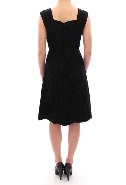 Schwarzes Laufstegkleid aus geblümter Spitze von Sicily