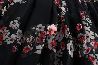 Masterpiece Schwarzes Laufstegkleid aus Seide mit Blumendruck