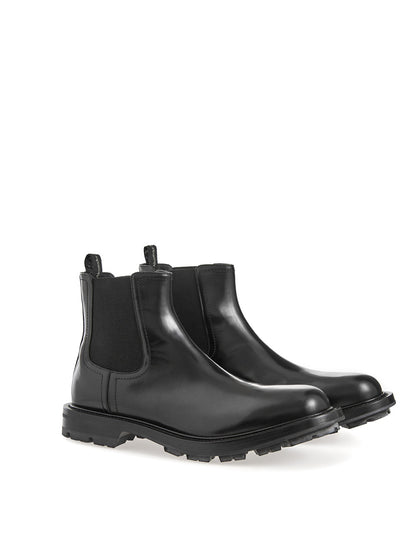 Schwarze Chelsea-Stiefel aus Leder mit Details aus Lackleder