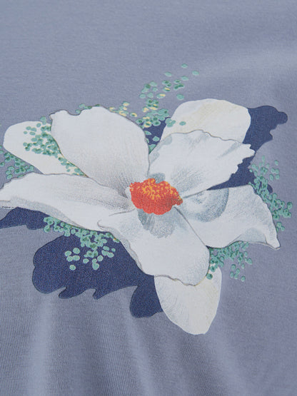 Hellblaues T-Shirt aus Baumwolle mit gedruckter Blume