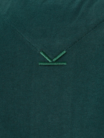 Grünes Piquet-Poloshirt aus Baumwolle mit ikonischem Logo auf der Vorderseite