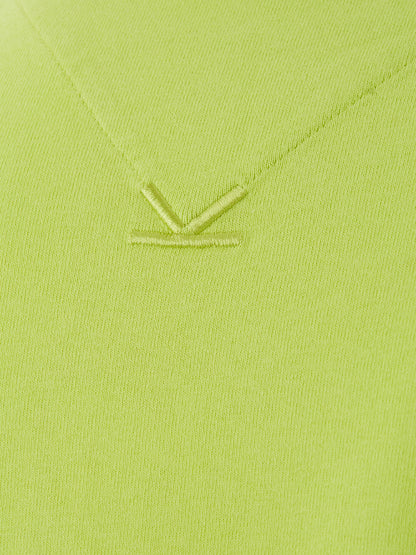 Gelbes T-Shirt aus Baumwolle mit kontrastierendem Logo auf den Ärmeln