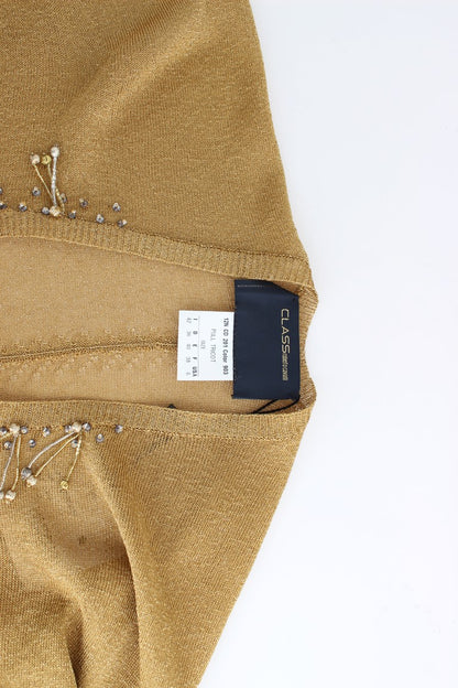 Goldfarbener Shrug mit Verzierungen