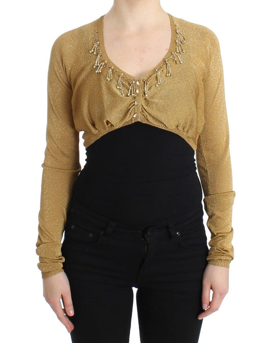 Goldfarbener Shrug mit Verzierungen