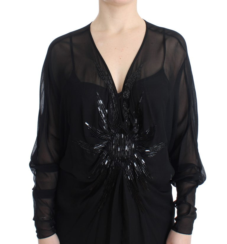 Schwarzes langärmeliges Seidenkleid