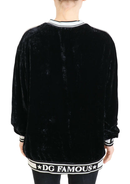 Schwarzer Pullover mit Rundhalsausschnitt aus Samt
