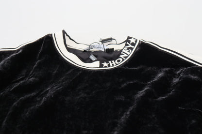 Schwarzer Pullover mit Rundhalsausschnitt aus Samt