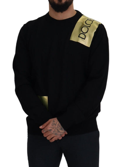 Pullover mit Rundhalsausschnitt aus schwarzer Wolle und goldenem Logo