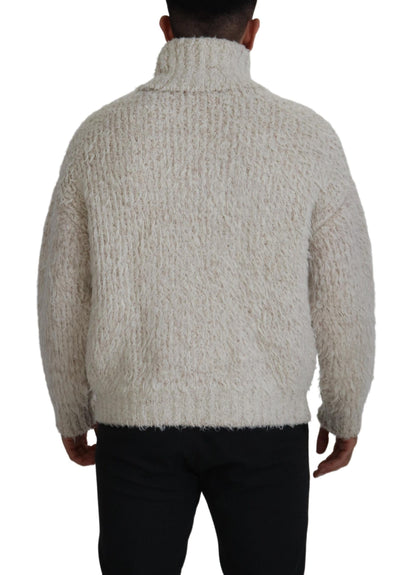 Rollkragenpullover aus cremefarbenem Wollstrick