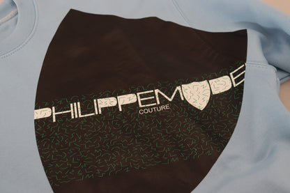 Hellblauer Pullover mit Logodruck und langen Ärmeln