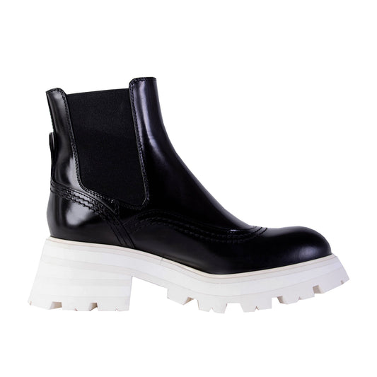 Chelsea-Stiefel aus schwarzem Leder mit weißer Sohle